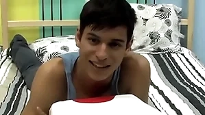Cute twink is playing with his horseshit via an stick