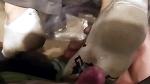 A handful of young guys depreciatory socks footjob