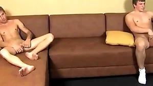 Cheerful twinks masturbate their press hard dicks to the fore cumming